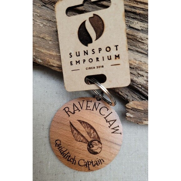 Harry Potter Wizarding Ravenclaw Wood Keychain Key Fob Quidditch Captain - Picture 1 of 5